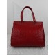 Handbag in dotted effect leather