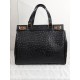 Handbag in dotted effect leather
